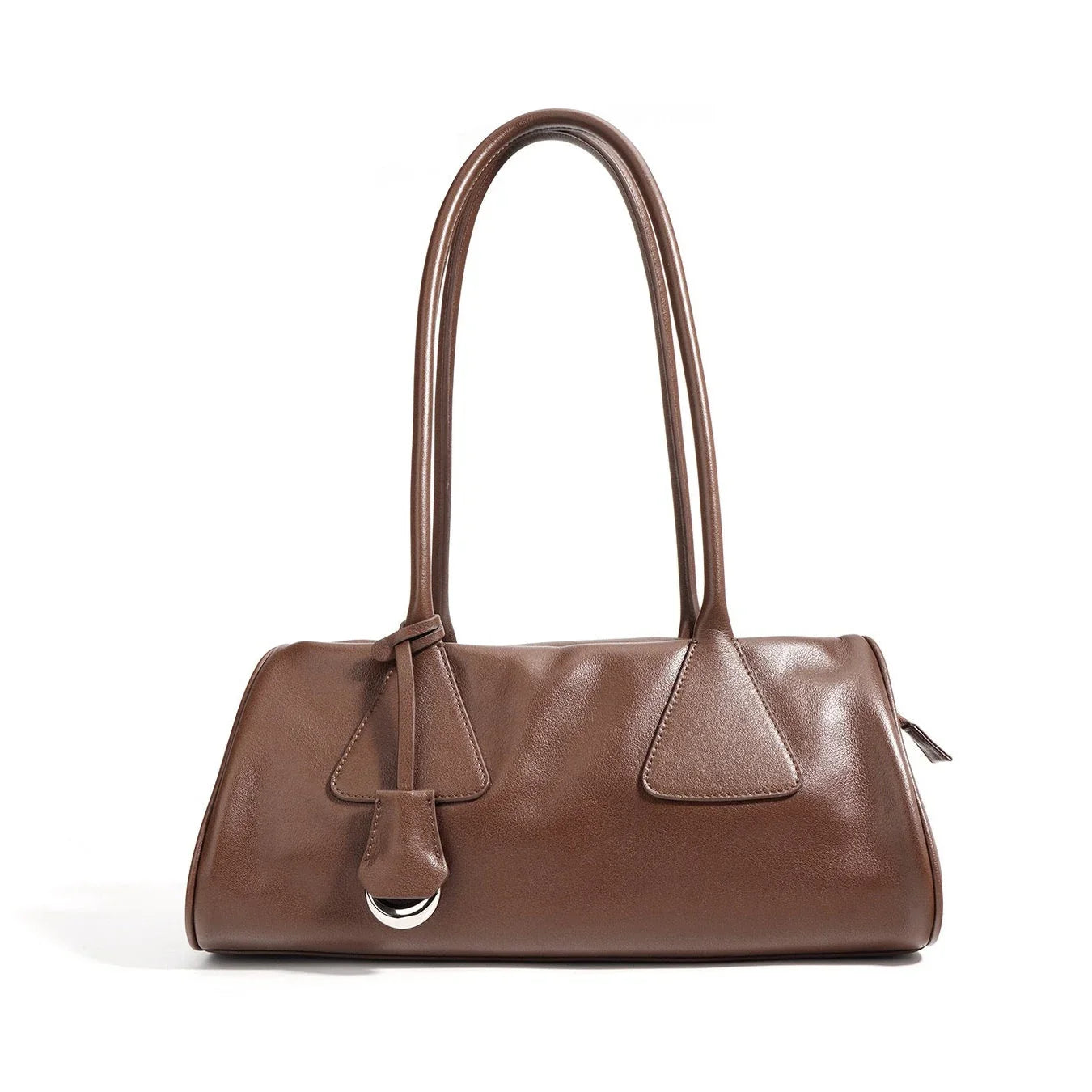 Brown leather shoulder bag with double handles and silver ring detail on white background