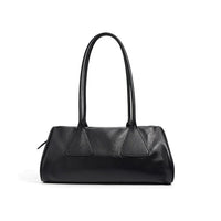 Black leather shoulder bag with double handles on white background