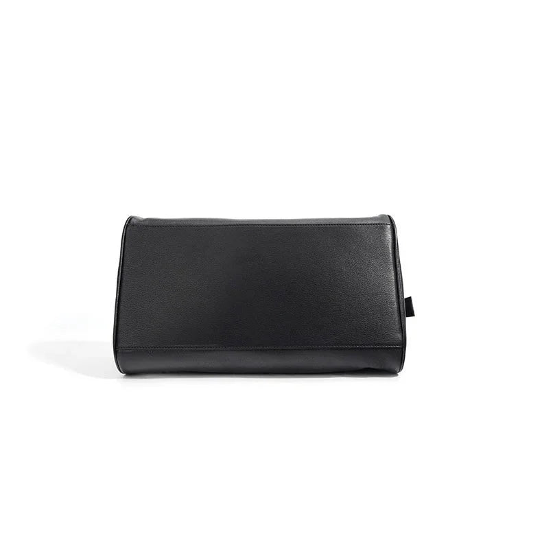Black leather clutch bag on white background