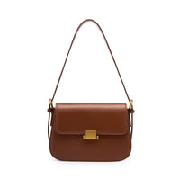 Brown leather shoulder bag with gold clasp on a white background