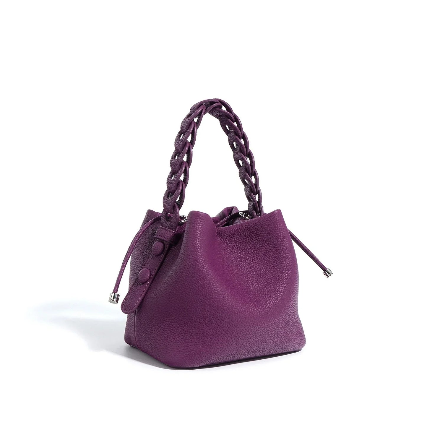 Purple leather bucket bag with braided handle and drawstring closure on white background