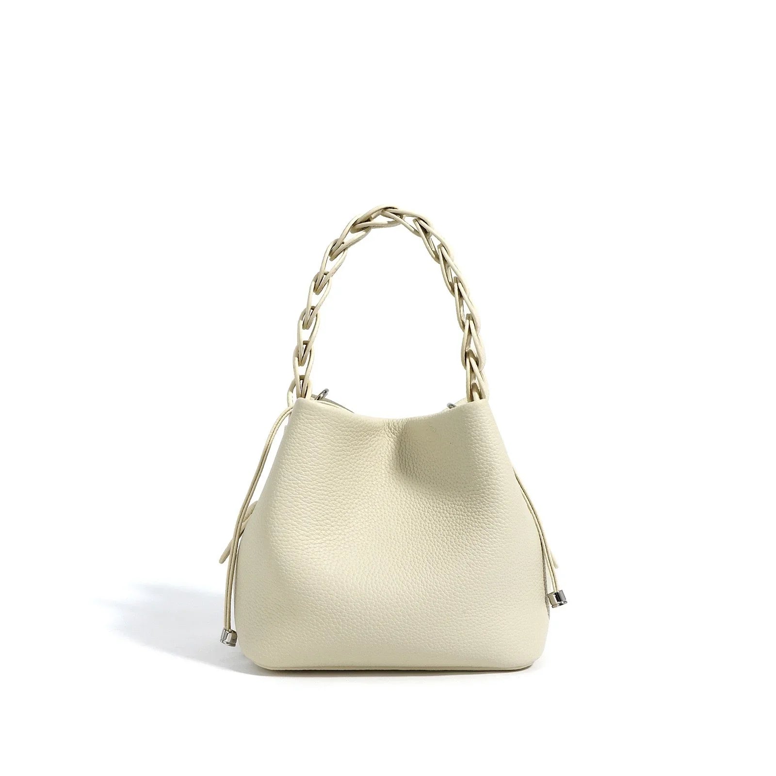 Cream leather bucket bag with braided handle and silver accents on a white background
