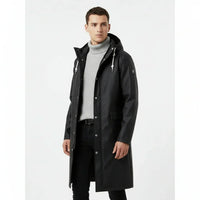 Man wearing a black raincoat on a white background