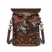 Brown leather crossbody bag shaped like an owl with large eyes and feather details