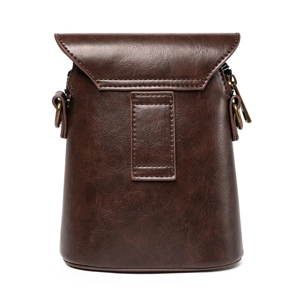 Brown leather crossbody bag with buckle detail and top flap closure