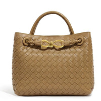 Tan woven leather handbag with gold buckle detail and top handle, luxury fashion bag