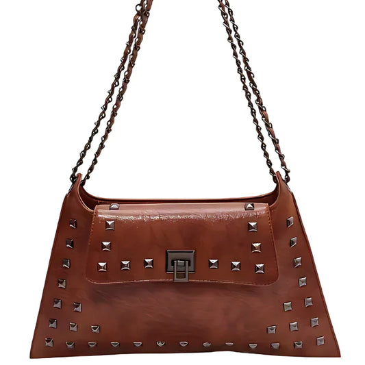Brown leather shoulder bag with metal studs and double chain strap on white background