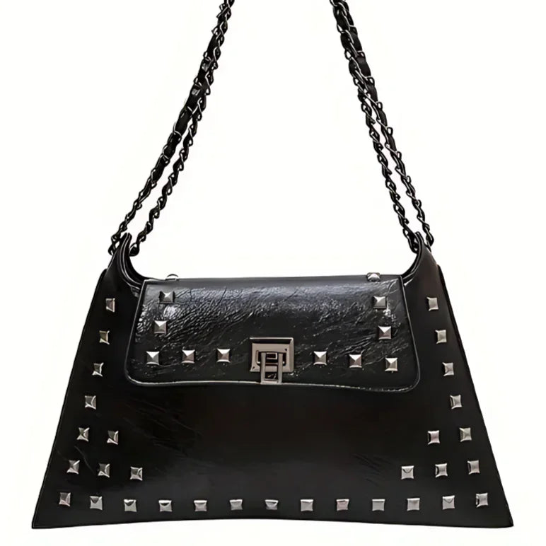 Black leather shoulder bag with silver studs, chain strap, and geometric clasp
