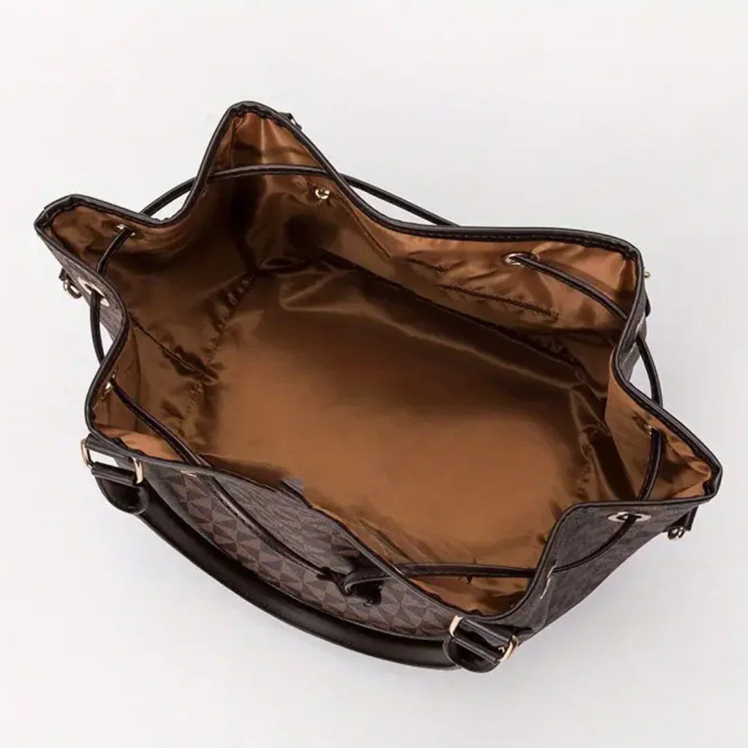 Open brown tote bag with spacious interior and geometric exterior pattern