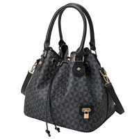 Black geometric pattern tote handbag with gold hardware and double handles