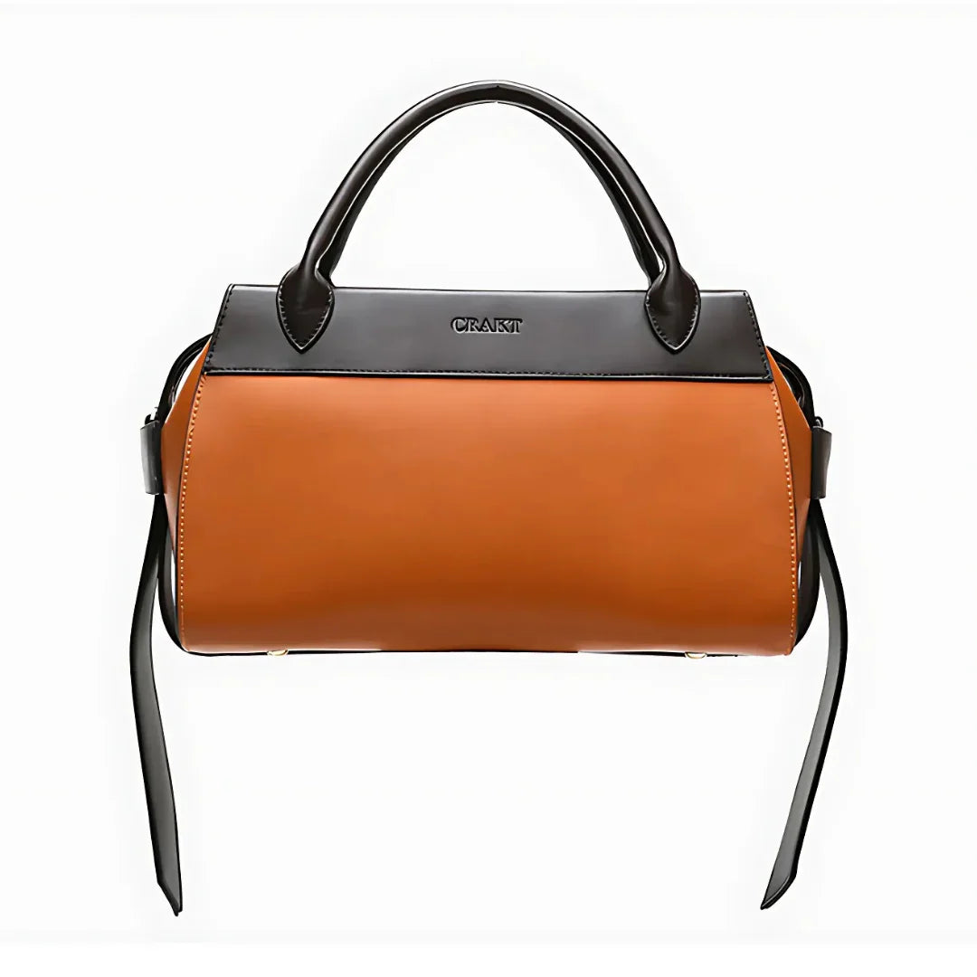 Brown and black leather handbag with top handles and CRAFT logo on front