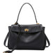 Black leather handbag with gold hardware and top handle on white background