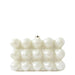 White pearl beaded clutch handbag with geometric design on a plain background
