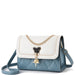 Blue and white crossbody purse with gold chain, bear-shaped charm, quilted design