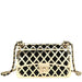 Luxury black handbag with gold lattice design and chain strap, elegant fashion purse