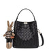 Black woven leather handbag with top handle and cute bunny keychain accessory