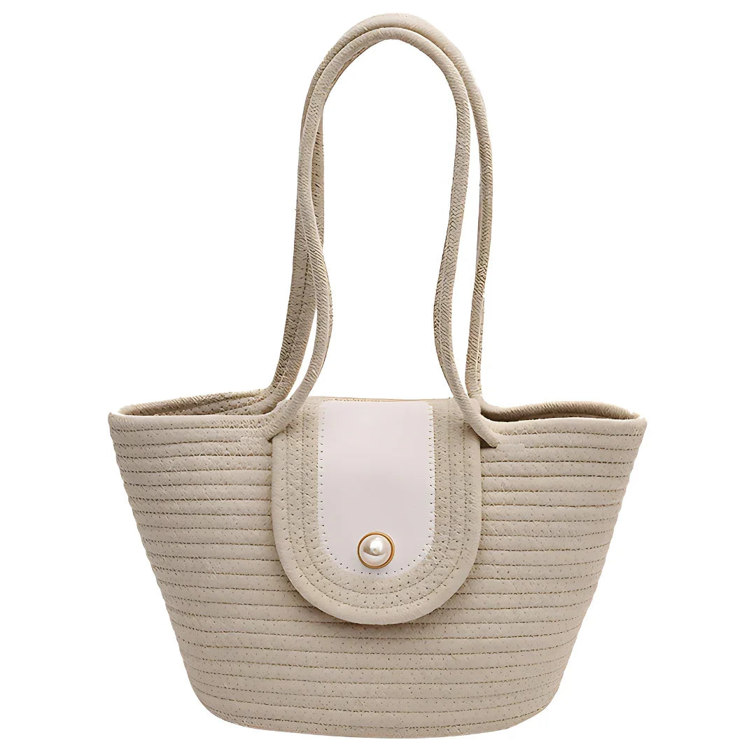 Beige woven straw tote bag with double handles and pearl button closure