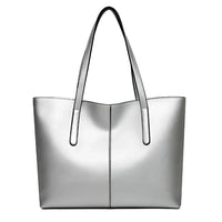 Silver tote bag with double handles and smooth faux leather finish