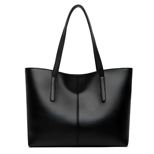 Black leather tote bag with double handles, minimalist and sleek design