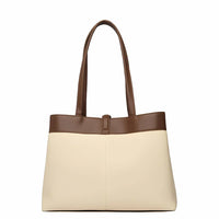 Two-tone tote bag with brown handles and beige body on white background