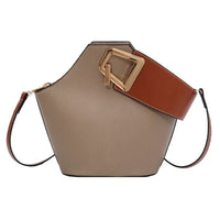 Geometric taupe leather handbag with wide brown strap and gold buckle detail