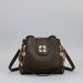 Brown patterned leather handbag with gold hardware and shoulder strap on gray background