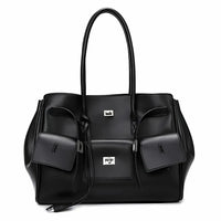 Black leather tote bag with silver hardware, front pockets, and double handles