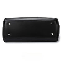 Black faux leather bag bottom with metal feet, clean minimalist design