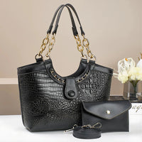 Black crocodile pattern leather handbag set with gold chain handles and matching pouch