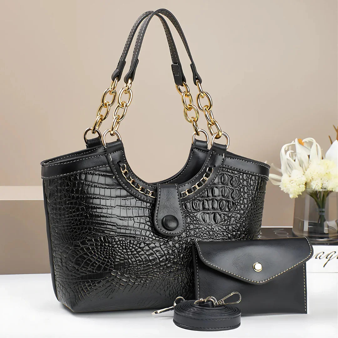 Black crocodile pattern leather handbag set with gold chain handles and matching pouch