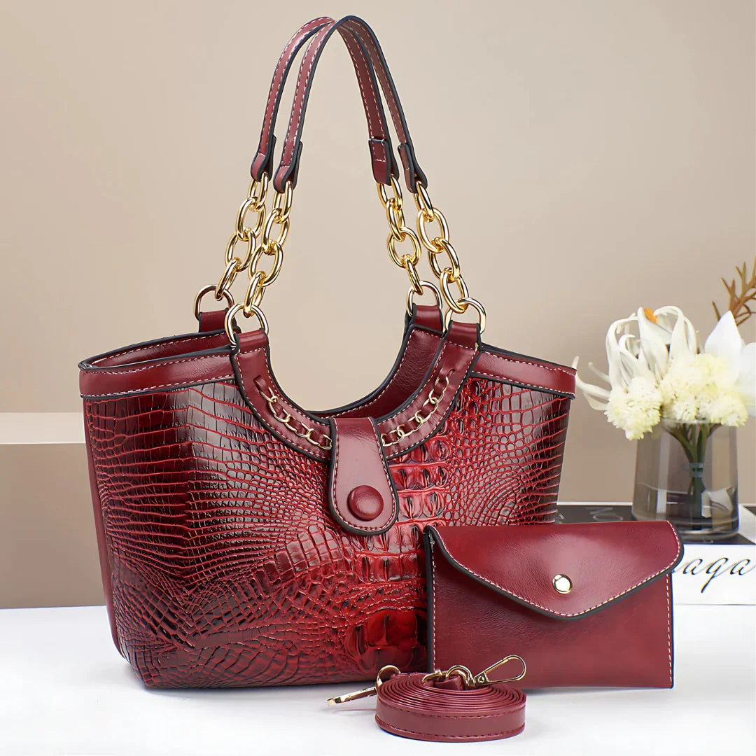 Red crocodile pattern handbag set with gold chain handles and matching wallet
