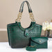 Green crocodile pattern handbag with gold chain handles, matching wallet and strap