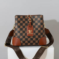Brown checkerboard MILANTIANSII crossbody bag with wide strap on white box