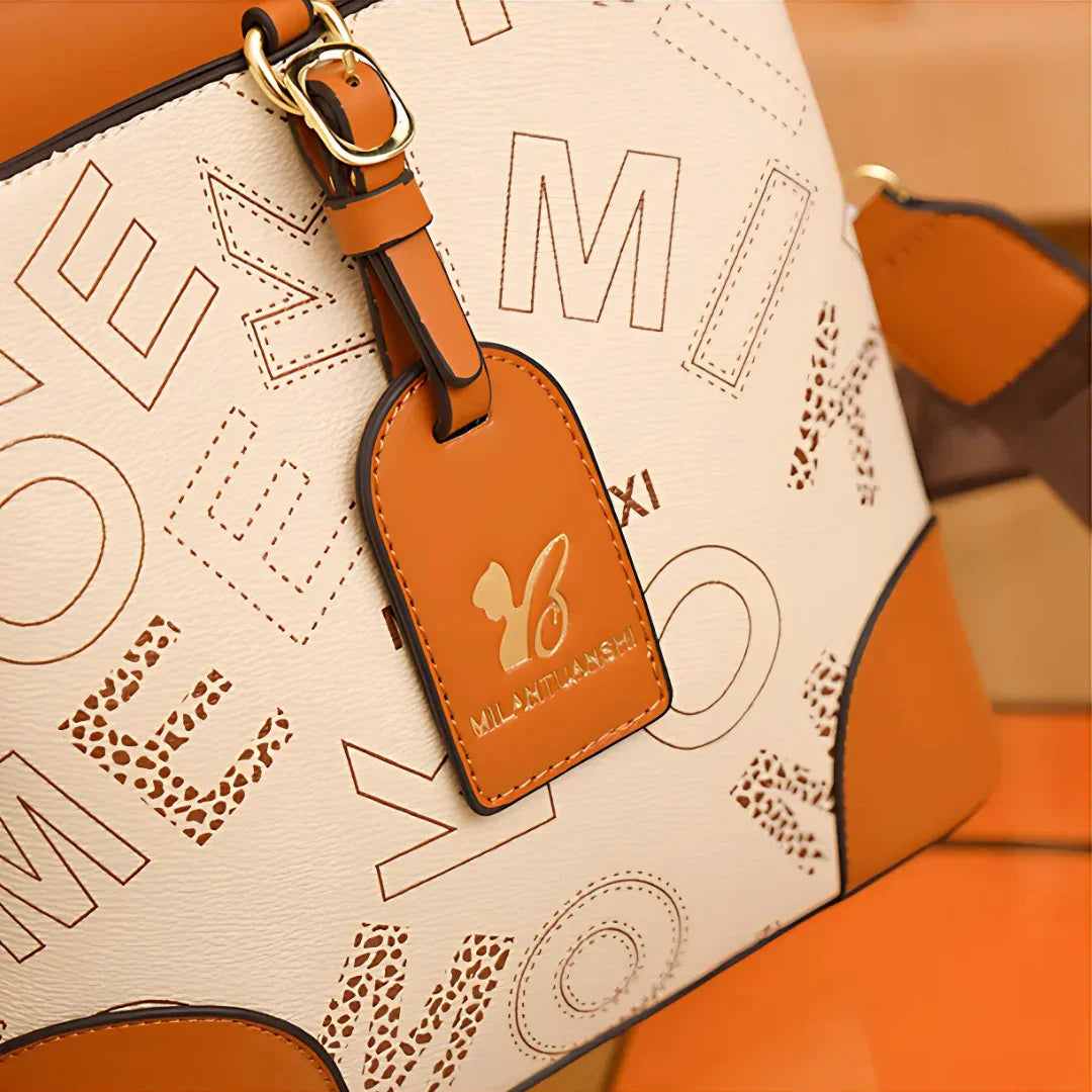 Cream and brown MILAXITILANGXI handbag with gold logo tag and letter pattern design