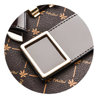 Close-up of brown leather handbag with gold buckle and floral pattern, PIANJEN logo