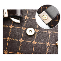 Closeup of brown Piaven patterned leather bag with gold magnetic snap clasp