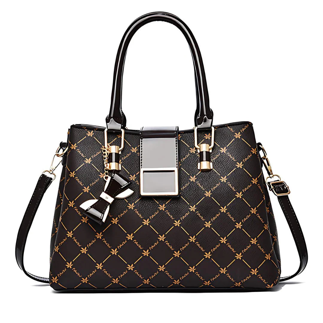 Black designer handbag with gold accents, diamond pattern, top handles, and bow keychain.