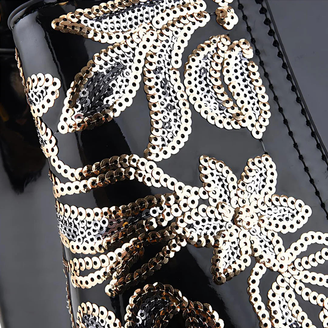 Black patent leather boot with gold and silver sequin floral embroidery detail