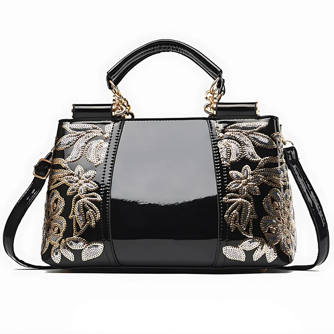 Black patent leather handbag with gold floral sequin embroidery and top handles