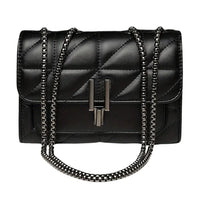 Quilted black leather shoulder bag with chain strap and metallic clasp