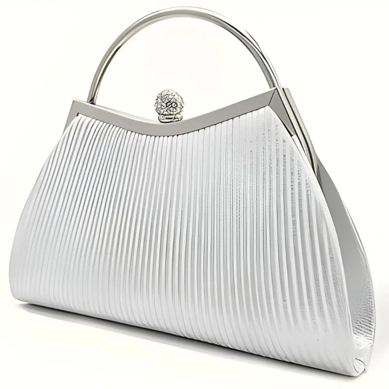 Elegant silver metallic pleated clutch purse with top handle and ornate clasp