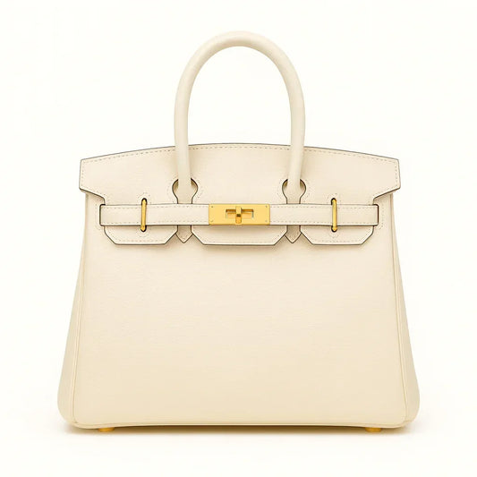 Women's genuine leather tote bag in beige with gold hardware on white background