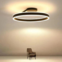 Black Round Minimalist LED Ceiling Light for Indoor Spaces - Rebooters