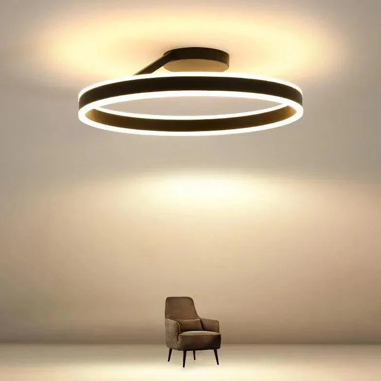 Black Round Minimalist LED Ceiling Light for Indoor Spaces - Rebooters