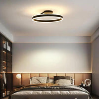 Black Round Minimalist LED Ceiling Light for Indoor Spaces - Rebooters