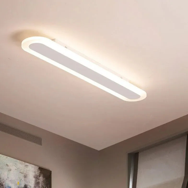 Long Oval LED Minimalist Ceiling Light for Modern Spaces - Rebooters