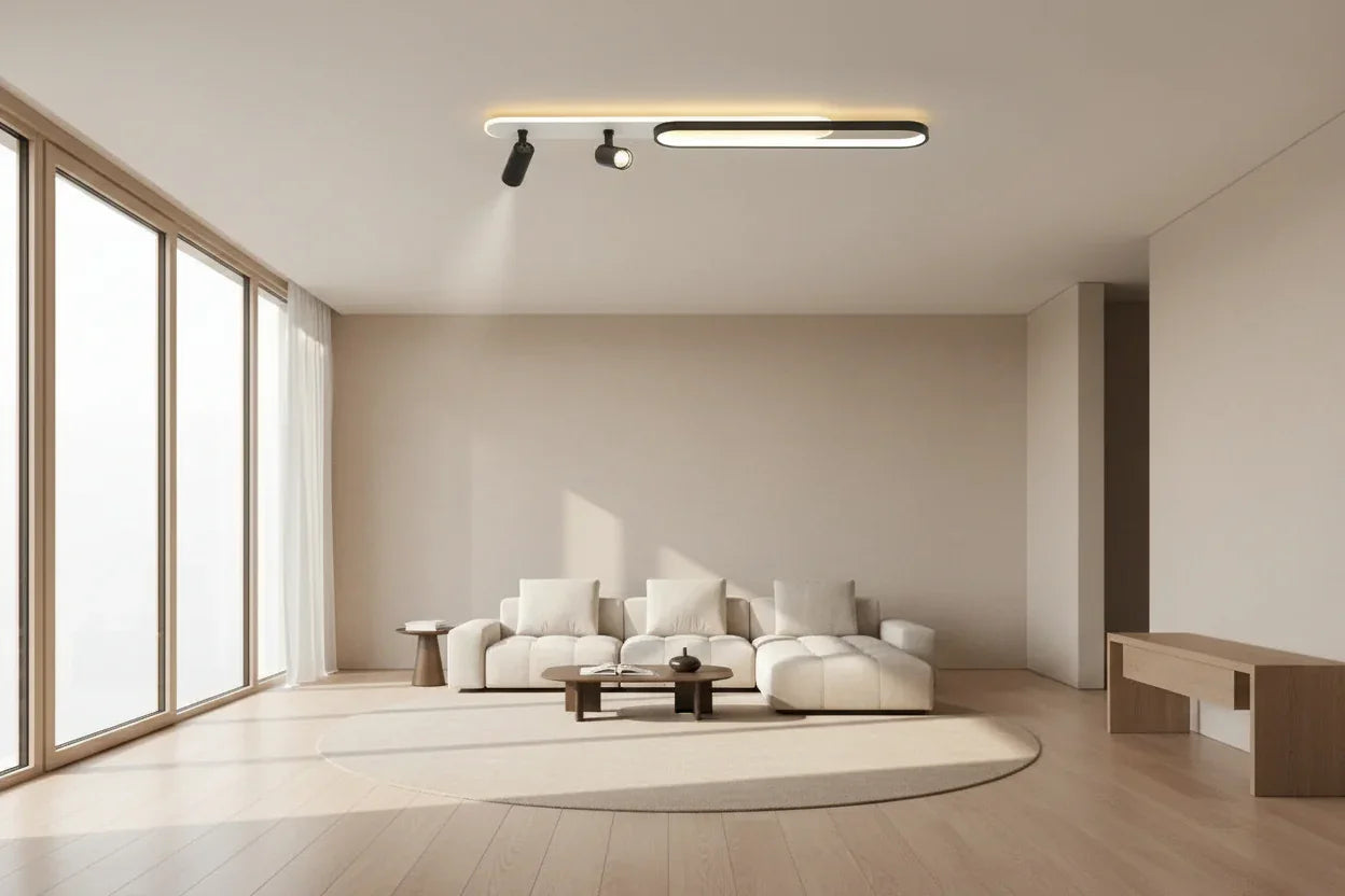 Modern ceiling light fixture in a room with neutral walls and a mirror.