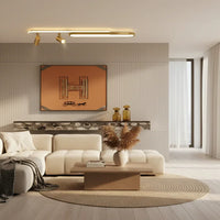 Modern living room with a white sofa, coffee table, and decorative elements.