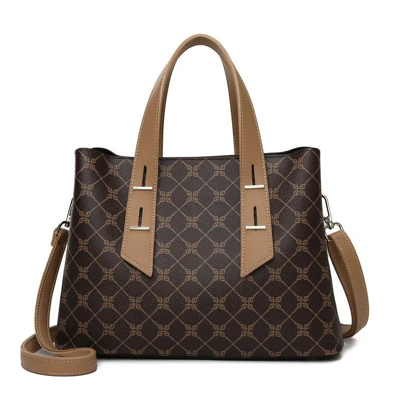 Brown leather tote bag with geometric pattern, tan handles, and detachable shoulder strap