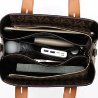 Open brown designer tote bag with organized compartments, holding laptop, umbrella, charger, notebook